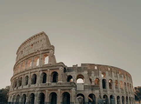 Rome Colosseum Experience | Safari Sutra Holidays Colosseum Rome at sunrise — Italy heritage tour packages for Indian travellers | Safari Sutra Holidays