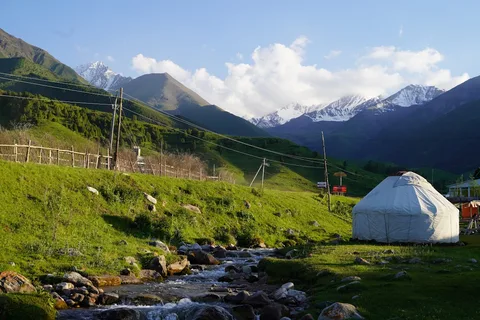 Yurt Camp Stay in Kyrgyzstan | Safari Sutra Holidays Traditional nomadic yurt camp beside an alpine lake in Kyrgyzstan | Safari Sutra Holidays