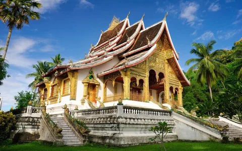 Wat Xieng Thong Temple Laos | Safari Sutra Holidays Gilded Buddhist temple Wat Xieng Thong Luang Prabang Laos – cultural heritage on Laos packages from India