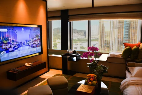 Luxury Hotels in Macau | Safari Sutra Holidays Luxury casino resort pool in Macau Cotai Strip — premium hotel stay for Indian travellers