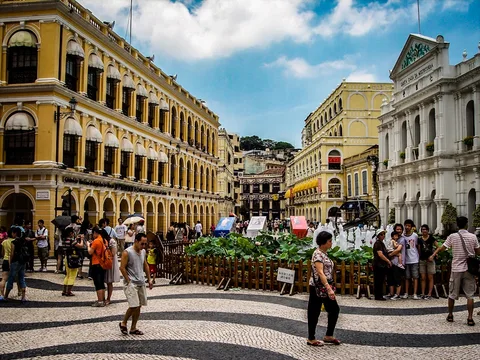 Macau UNESCO Heritage Walk | Safari Sutra Holidays Tourists walking the UNESCO heritage trail near Ruins of St Paul's, Macau — tour packages from India