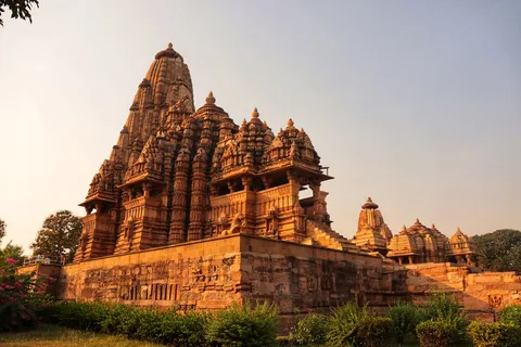 Khajuraho Temple Heritage — Madhya Pradesh Cultural Tour | Safari Sutra Holidays Khajuraho temple stone carvings UNESCO World Heritage Site Madhya Pradesh | Safari Sutra Holidays