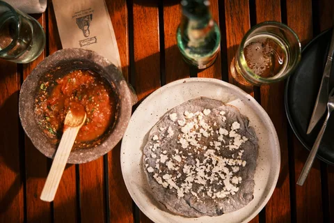 Local Oaxacan Food at Mexico | Safari Sutra Holidays Traditional Oaxacan food spread with mole, tlayudas and guacamole, Mexico food tour | Safari Sutra