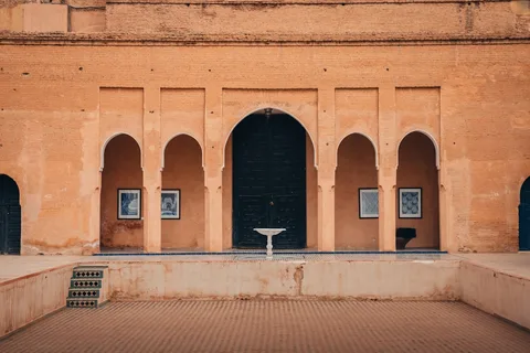 Riad Stay in Marrakech Morocco | Safari Sutra Holidays Traditional Moroccan riad courtyard with tiled fountain — riad stays in Morocco | Safari Sutra Holidays