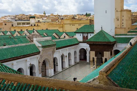Fes Medina Cultural Walk Morocco | Safari Sutra Holidays Artisan in Fes medina souq — cultural experience Morocco tour for Indian travellers | Safari Sutra Holidays