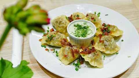 Local Polish Cuisine | Safari Sutra Holidays Traditional Polish pierogi and local cuisine — food trail in Krakow | Safari Sutra Holidays