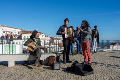 Fado Music Culture in Lisbon | Safari Sutra Holidays Fado singer performing in Alfama Lisbon Portugal — cultural experience on Portugal holiday package