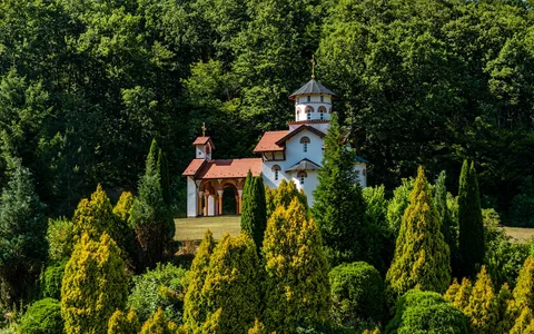 Serbian Heritage & Monasteries | Safari Sutra Holidays Serbian Orthodox monastery in forested landscape — cultural heritage on Serbia tour from India