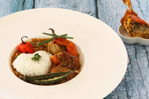 Local Creole Food in Seychelles | Safari Sutra Holidays Seychellois Creole cuisine — grilled fish with coconut curry, local spices and tropical fruits