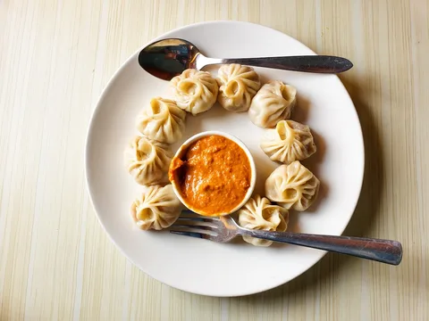 Local Food in Sikkim | Safari Sutra Holidays Steaming momos and thukpa — local food on Sikkim tour packages | Safari Sutra Holidays