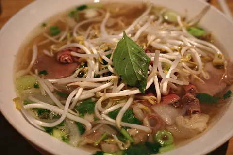 Vietnamese Street Food Hanoi | Safari Sutra Holidays Traditional Vietnamese pho noodle soup at a Hanoi street stall | Safari Sutra Holidays