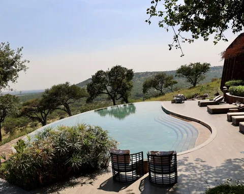 Luxury Bush Camp Zambia Safari | Safari Sutra Holidays Luxury tented bush camp at sunset in Zambia — curated safari accommodation | Safari Sutra Holidays