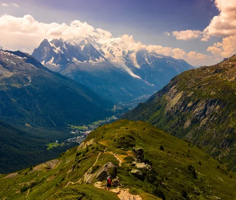 France Untamed: Chamonix, the Pyrenees & Verdon Gorge | Safari Sutra Holidays Via ferrata climber on Mont Blanc massif near Chamonix — France adventure tour package