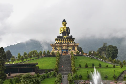 The large, serene statue of Lord Buddha overlooks the landscaped gardens of the Buddha Park in Ravangla, Sikkim