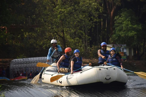 Dandeli river scene River scene with lush banks in Dandeli