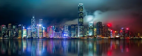 Hong Kong & Macau Harbour Romance: 5 Nights for Couples | Safari Sutra Holidays Hong Kong harbour skyline at night — honeymoon package from India for couples