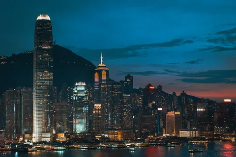 Hong Kong & Macau Senior Serenity: 6 Nights | Safari Sutra Holidays Victoria Harbour Hong Kong skyline at dusk — senior-friendly Hong Kong tour package from India