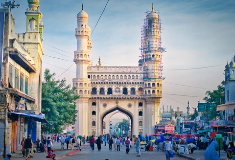 The Iconic Charminar in Hyderabad, Telangana The historic Charminar monument, with its four grand minarets, stands amidst the bustling streets and markets of Old City, Hyderabad