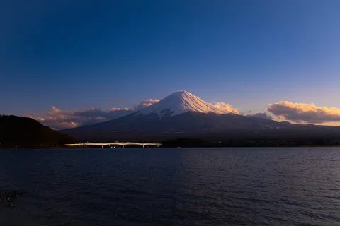 Japan Family Discovery: Tokyo, Fuji & Kyoto | Safari Sutra Holidays Mount Fuji reflected in Lake Kawaguchi — Japan family tour package from India via Safari Sutra