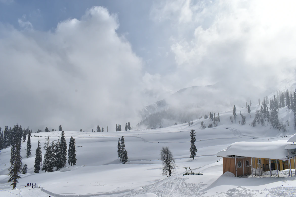 Snow-covered Gulmarg meadow and Gondola in winter Kashmir — winter snow holiday package India