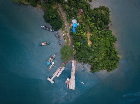 Port Blair shoreline with turquoise waters with boats