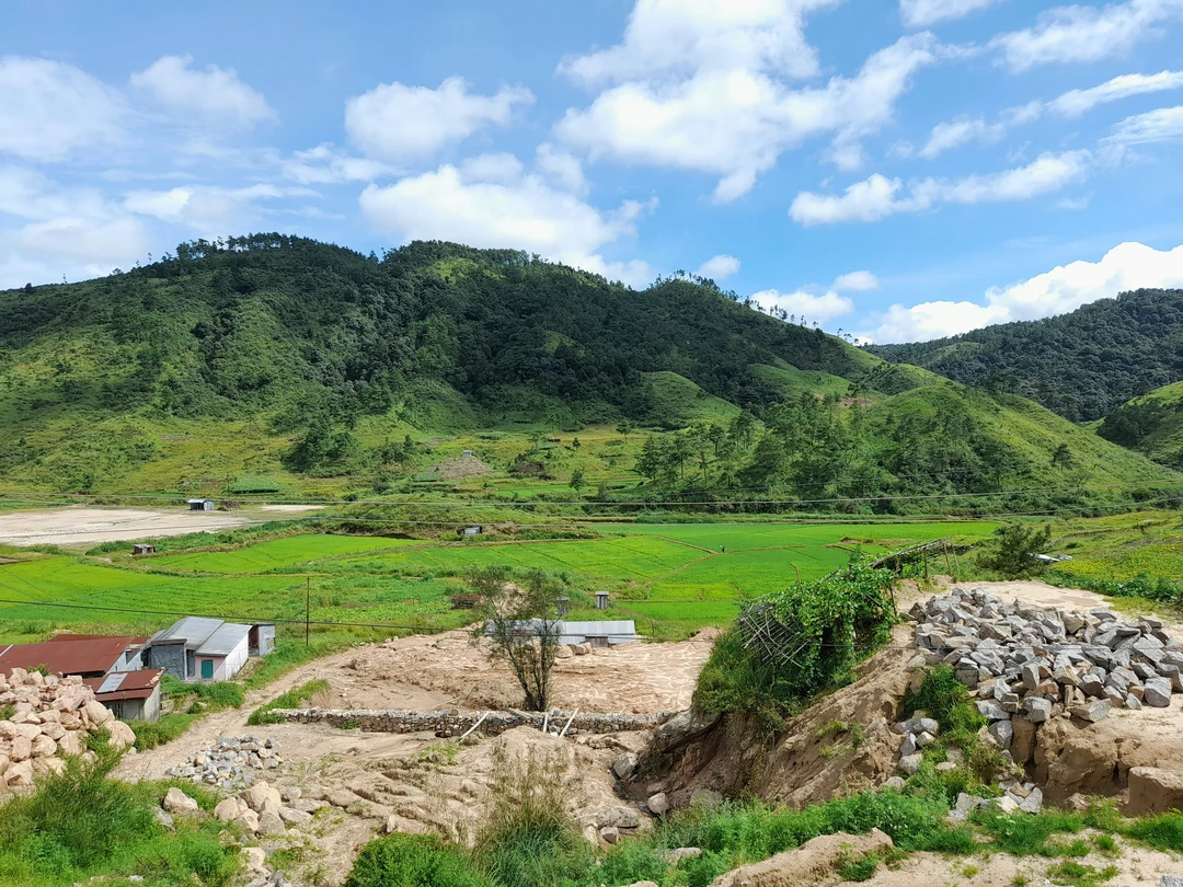 Sunrise over Shillong hills with mist-filled valleys
