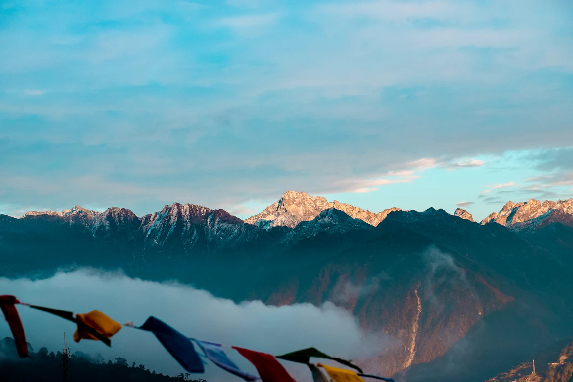 Kanchenjunga peak at sunrise seen from Pelling Sikkim — family tour package from India