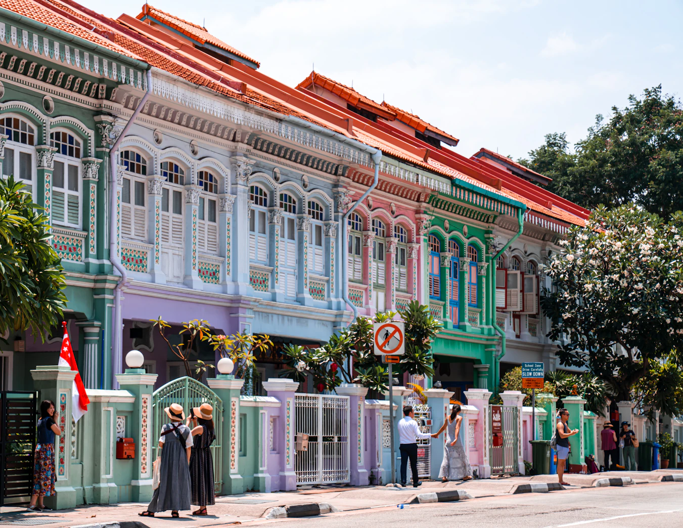 Singapore Through the Lens: 6 Nights of Street Light, Architecture & Living Colour | Safari Sutra Holidays Row of colourful Peranakan shophouses in Singapore — Singapore photography tour from India