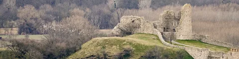 Slovakia Photography Circuit: Folk Villages, Castles & Tatra Light | Safari Sutra Holidays Spišský Hrad castle ruins emerging from morning mist at dawn Slovakia photography tour from India